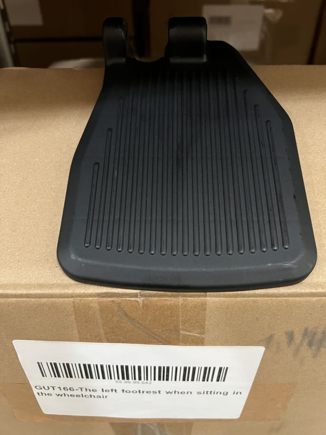 GUT166-The left footrest when sitting in the wheelchair